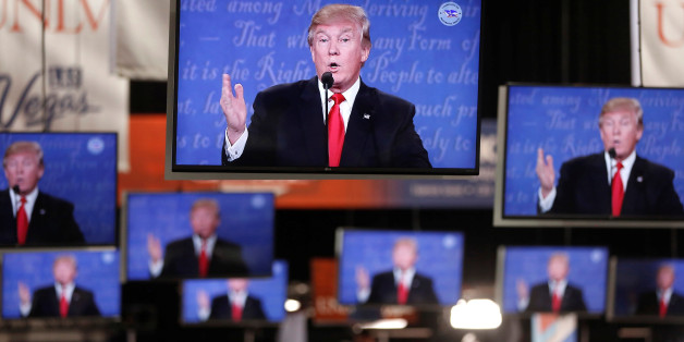 Republican U.S presidential nominee Donald Trump is shown on TV monitors in the media filing room on the campus of University of Nevada, Las Vegas, during the last 2016 U.S. presidential debate in Las Vegas, U.S., October 19, 2016. REUTERS/Jim Urquhart