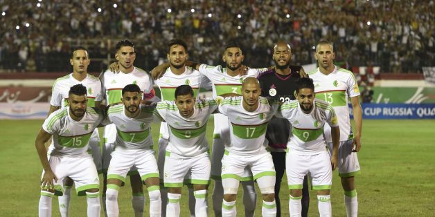 Algeria's national football team players (Front row from L) Hilal Soudani El Arabi, Karim Mahrez Riad, Taider Sliti Saphir, Aldane Guedioura, Ryad Boudebouz, (back row from L) Mehdi Zeffane, Carl Medjani, Liassine Cadamuro-Bentaiba, Faouzi Ghoulam, Rais M'Bolhi, Islam Slimani pose prior to the Fifa World Cup 2018 Africa qualifying football match between Algeria and Cameroon at the Mustapha Tchaker Stadium in Blida on October 9, 2016. / AFP / Ryad Kramdi (Photo credit should read RYAD KRAM