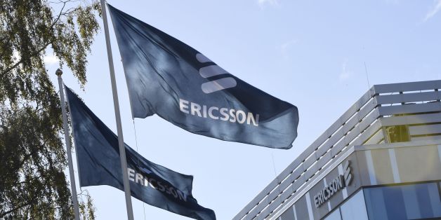 Flags with the logo of telecoms equipment maker Ericsson flutter outside the company's headquarters in Stockholm on October 4, 2016.
Ericsson confirmed recent media reports that it will cut 3,000 jobs in Sweden, including in production, research and development. / AFP / TT News Agency / Maja SUSLIN / Sweden OUT (Photo credit should read MAJA SUSLIN/AFP/Getty Images)