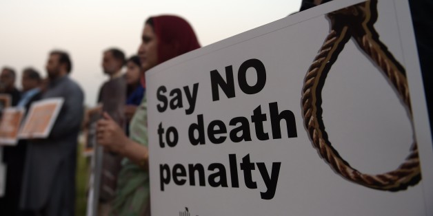 Activists from the Human Rights Commission of Pakistan (HRCP) carry placards during a demonstration to mark International Day Against the Death Penalty in Islamabad on October 10, 2015. Pakistan lifted a moratorium on executions in December 2014 after Taliban gunmen massacred more than 150 people at a school, at first only in terror-related offences, but later for all capital cases. Around 200 people have been executed since the moratorium was lifted, and no mercy petitions to the president have