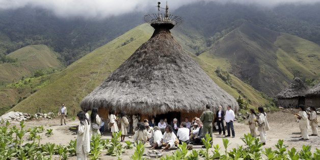 SAN MIGUEL, COLOMBIA - FEBRUARY 15: German Federal Minister of Foreign Affairs Frank-Walter Steinmeier is visiting a village of the Kogi people, an Indigenous ethnic group living at a holy place on February 15, 2015 in San Miguel, Colombia. The Kogi people live largely isolated from modern society in peace with their environment. (Photo by Thomas Koehler/Photothek via Getty Images)