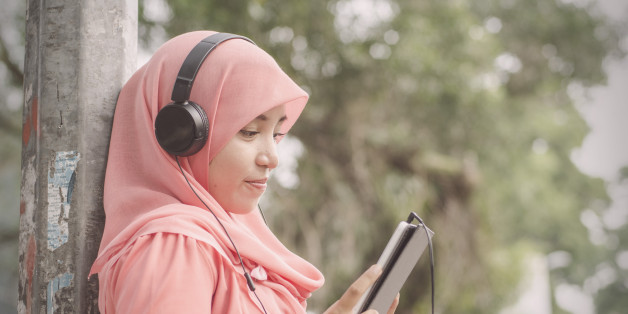 Woman using tablet computer