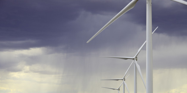 Summer thunderstorms pass through huge wind farm in central Utah. This facility generates over 200 Megawatts of electricity for Southern California.