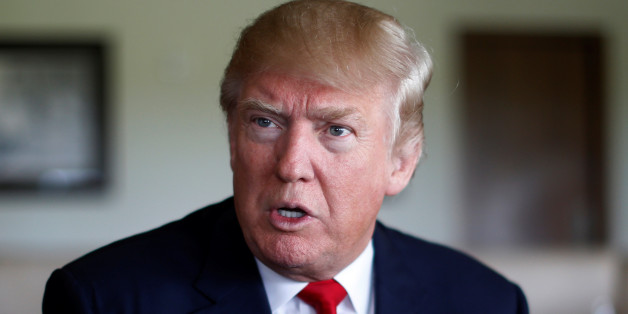 Republican U.S. presidential nominee Donald Trump sits for an interview at Trump National Doral golf club in Miami, Florida, U.S. October 25, 2016. REUTERS/Jonathan Ernst