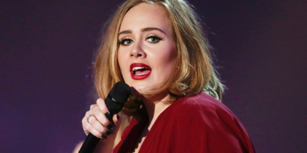 FILE - In this Feb. 24, 2016 file photo shows Adele onstage at the Brit Awards 2016 at the 02 Arena in London. NFL and Pepsi said Monday they have had several conversations with artists about performing at the Super Bowl, but said they havenât formally asked Adele or any other musicians to appear. The British singer told an audience Saturday, Aug. 13, 2016, at her Los Angeles concert that she was asked to perform at the event. (Photo by Joel Ryan/Invision/AP, File)