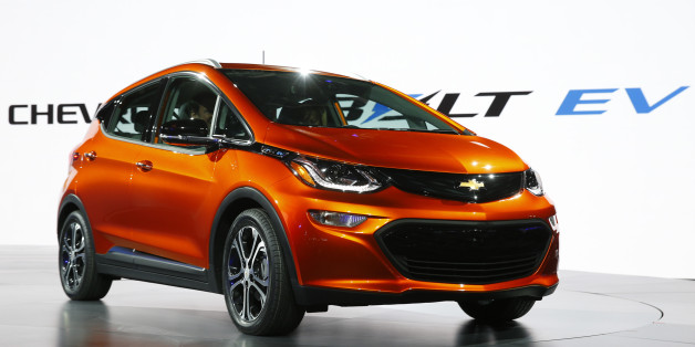 FILE - In this Monday, Jan. 11, 2016, file photo, the Chevrolet Bolt EV debuts at the North American International Auto Show in Detroit. Automakers now say hybrid and electric vehicles perform better than gas-powered vehicles. (AP Photo/Paul Sancya, File)