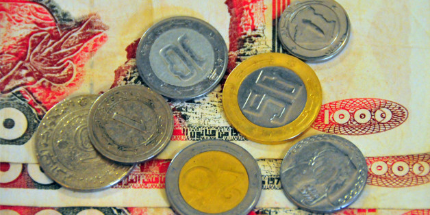 Algerian 1000 dinar bank notes and coins - currency of Algeria, DZD - photo by M.Torres