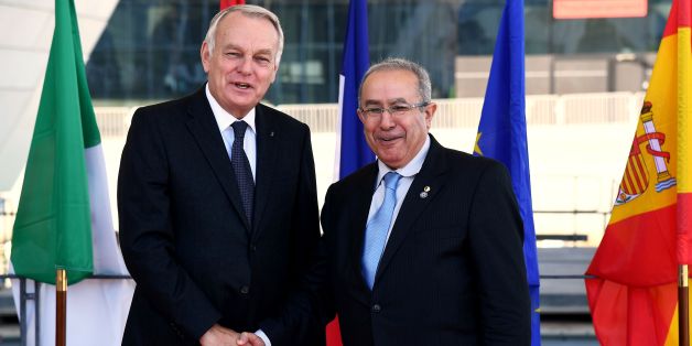 French Foreign Minister Jean-Marc Ayrault (L) shakes hands with his Algerian counterpart Ramtane Lamamra (R) upon his arrival at the Villa Mediterranée in Marseille, southern France, on October 28, 2016, for the 13th meeting of the Foreign Affairs Ministers of the Western Mediterranean (5+5 Dialogue). / AFP / ANNE-CHRISTINE POUJOULAT (Photo credit should read ANNE-CHRISTINE POUJOULAT/AFP/Getty Images)