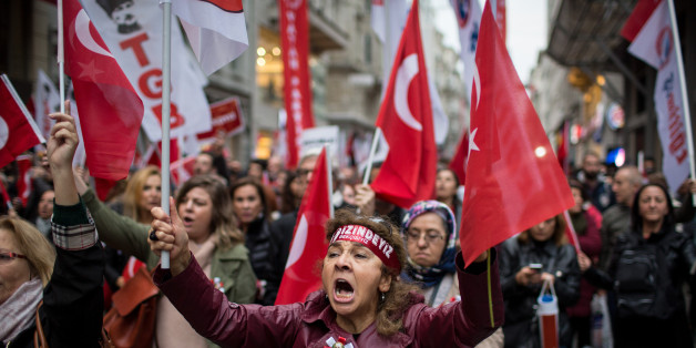 ISTANBUL, TURKEY - OCTOBER 29: People wave flags and shout slogans during a rally marking the 93rd Anniversary of Turkey's Republic day on October 29, 2016 in Istanbul, Turkey. Republic Day is a commemoration of the proclamation of the Republic of Turkey, which was first officially declared in 1923 by founder and first president Mustafa Kemal Ataturk. (Photo by Chris McGrath/Getty Images)