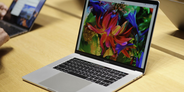 MacBook computers are shown in a demo room following the announcement of new products at Apple headquarters Thursday, Oct. 27, 2016, in Cupertino, Calif. (AP Photo/Marcio Jose Sanchez)