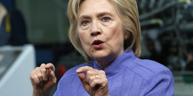 FILE - In this June 15, 2016, file photo, Democratic presidential candidate Hillary Clinton speaks in Hampton, Va. The vast majority of Americans say they are afraid of at least one of the two major candidates for president winning the White House, a remarkable finding that reflects an unsettled nation unhappy with its choice. A new AP-GfK poll finds that 81 percent of Americans say they would feel afraid following the election of one of the two polarizing politicians: Clinton or Donald Trump. (AP Photo/Steve Helber, File)
