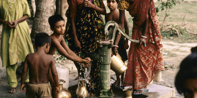 In the 1970's UNICEF initiated the boring of deep wells in villages across the Ganges Delta in a well intentioned mission to eradicate water born diseases and epidemics. Years later it was discovered that the aquifers which store the clean water also contain a deadly element which has always been carried by The Ganges from the Himalyas ARSENIC. It is now poisoning close to one hundred million inhabitants and the majority of the population have no choice but to continue drinking the water. Many people developed skin deformities but it was only in 1993 that Dipankar Chakraborti a researcher was able to confirm the common factor Arsenic in the deep wells thus in the derinking water and in the bodies of the consumers. Excessive levels of Arsenic in the body lead to cancer. (Photo by In Pictures Ltd./Corbis via Getty Images)