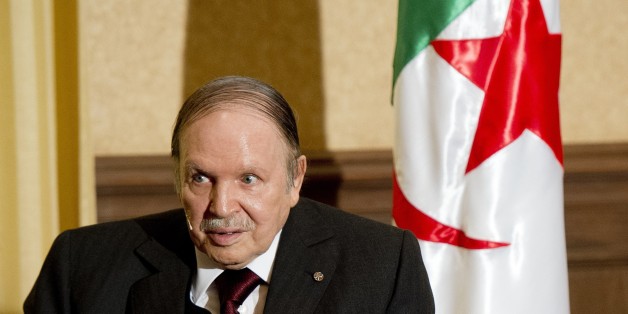 Algerian President Abdelaziz Bouteflika meets with his French counterpart Francois Hollande at the Zeralda private residence on June 15, 2015, in Algiers. Hollande is on a friendship and working visit to Algeria at the invitation of Algerian President, Abdelaziz Bouteflika as the two nations, once bitter foes, work ever closer to tackle regional threats from Mali to Libya. AFP PHOTO / POOL / ALAIN JOCARD (Photo credit should read ALAIN JOCARD/AFP/Getty Images)