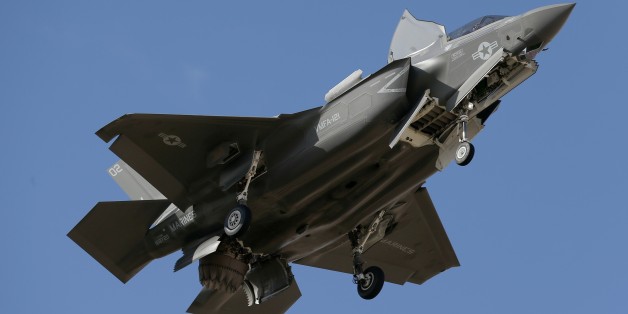 An F-35B fighter jet, the U.S. Marine Corps variant of the F-35 from the Marine Corps Air Station in Yuma, Ariz., flies into Luke Air Force Base Tuesday, Dec. 10, 2013, in Goodyear, Ariz. The new jet shows off its abilities at the request of senior defense officials from Singapore, who are visiting Luke AFB as part of Forging Sabre, a Singapore armed forces exercise taking place at Luke and at the Barry M. Goldwater training range. Singapore is considering purchasing F-35s in the future. (AP Pho