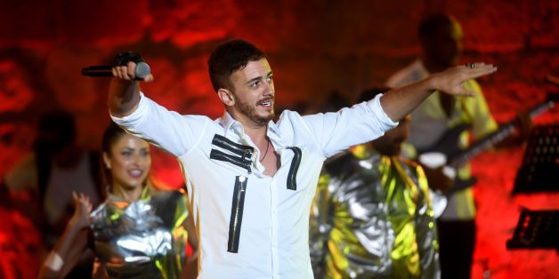 Morocco singer Saad Lamjarred performs during the 52 sesion of the International Carthage Festival on July 30, 2016 at the romain theatre of carthage near Tunis. / AFP / FETHI BELAID (Photo credit should read FETHI BELAID/AFP/Getty Images)