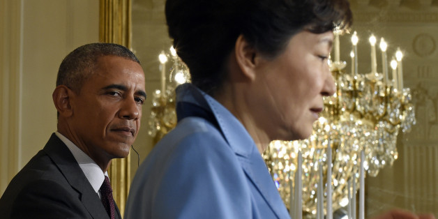 President Barack Obama listens as South Korean President Park Geun-hye speaks during their joint news conference in the East Room of the White House in Washington, Friday, Oct. 16, 2015. (AP Photo/Susan Walsh)