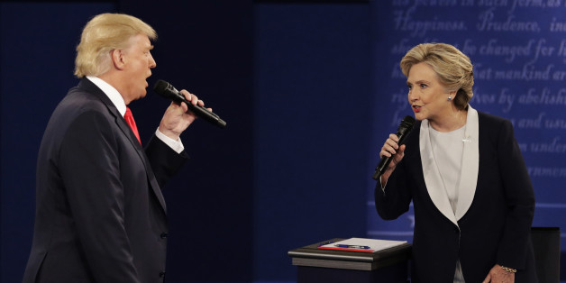 FILE - In this Sunday, Oct. 9, 2016, file photo, Republican presidential nominee Donald Trump and Democratic presidential nominee Hillary Clinton speak during the second presidential debate at Washington University in St. Louis. Trump gets outsized attention for what heâs tweeting and retweeting on a near-daily basis. But Clinton has a formidable digital media army, her own app and a rapid response team ready to blast out shareable soundbites from convention speeches, photos, videos and even temporary location-specific Snapchat filters mocking Republicans. (AP Photo/John Locher, File)