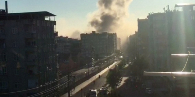 Smoke rises from an explosion in a central district of Diyarbakir, the largest city in Turkey's mainly Kurdish southeast, in this still image taken from video November 4, 2016. REUTERS/Reuters TV TPX IMAGES OF THE DAY