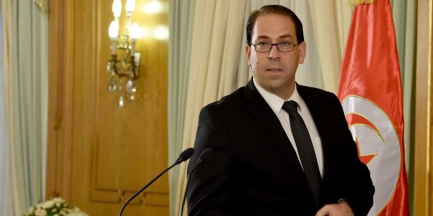 Tunisia's premier-designate Youssef Chahed speaks during a press conference to present his proposed new unity government list after he submitted it to the president on August 20, 2016 in Carthage, near the capital Tunis.
Chahed, a 40-year-old former local affairs minister and member of the Nidaa Tounes party, had been given 30 days to form a cabinet. If his cabinet wins the backing of parliament, Chahed will become the North African country's youngest premier since independence from France in 1956.
/ AFP / FETHI BELAID (Photo credit should read FETHI BELAID/AFP/Getty Images)