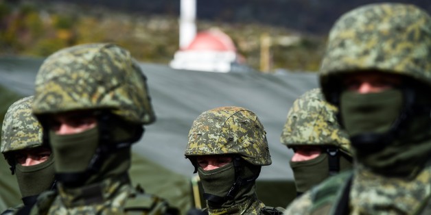 Members of the Kosovo Security Force take part in a field exercise in the village of Nashec near the town of Prizren on October 27, 2016.
Eight members of the KSFs Rapid Reaction Brigade have been awarded a gold medal in the British Armys prestigious and extremely challenging patrolling and military skills exercise known as the Cambrian Patrol. / AFP / ARMEND NIMANI (Photo credit should read ARMEND NIMANI/AFP/Getty Images)