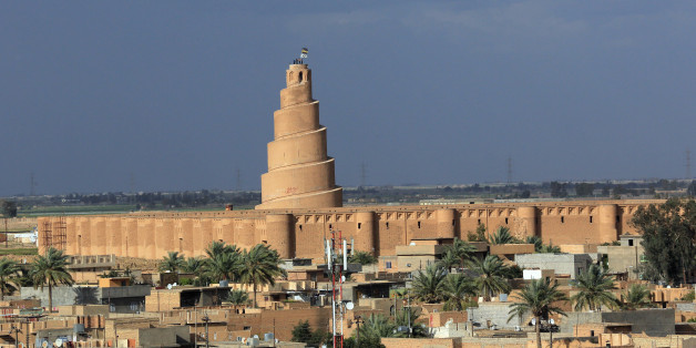 People visit the al-Malwiya minaret at the Al-Mutawakkil Mosque in Samarra, 60 miles (95 kilometers) north of Baghdad, Iraq Thursday, March 17, 2016. (AP Photo/Hadi Mizban)