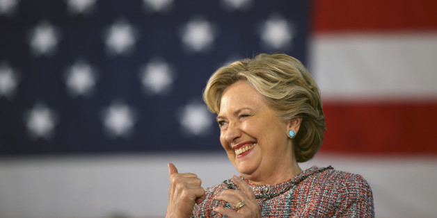 FOR STORY MOVING SUNADY NOV 6TH 0600EDT/1100GMTU.S. Democratic presidential nominee Hillary Clinton winks at a supporter as she talks about climate change at a rally at Miami Dade College with former Vice President Al Gore in Miami, Florida, U.S. October 11, 2016. REUTERS/Lucy Nicholson/File Photo