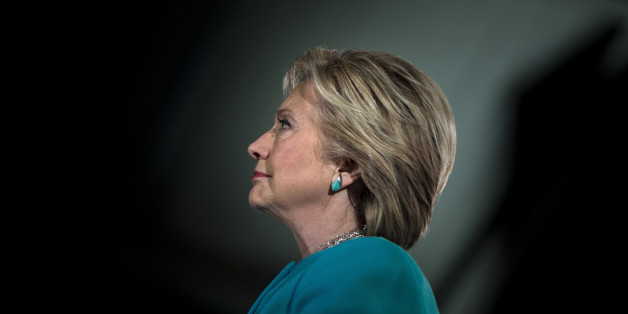 TOPSHOT - US Democratic presidential nominee Hillary Clinton waits to speak during a rally at the Armory November 6, 2016 in Manchester, New Hampshire. / AFP / Brendan Smialowski (Photo credit should read BRENDAN SMIALOWSKI/AFP/Getty Images)