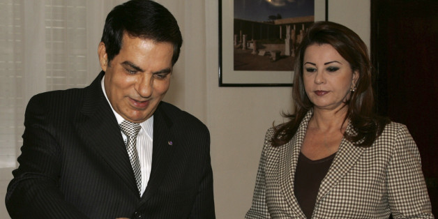 Tunisian President Zine El Abidine Ben Ali, left, casts his ballot for municipal elections, as his wife Leila Ben Ali, right, looks on, in Carthage, Tunisia, Sunday, May 9, 2010. (AP Photo/Hassene Dridi)