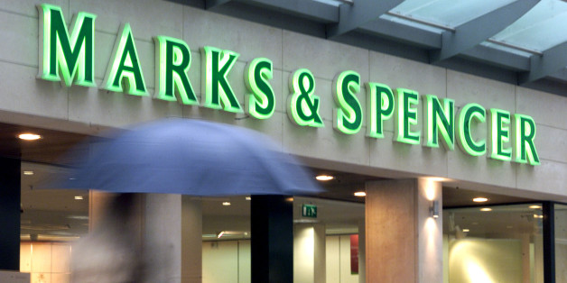 A pedestrian walks past a Marks & Spencer shop in Brussels March 29, 2001. Britain's Marks & Spencer clothing chain, struggling abroad and battling retail competition at home, said on Thursday it would shed much of its non-UK business and cut over 4,000 jobs in a radical shake-up to rebuild profits and sales.
THR/WS