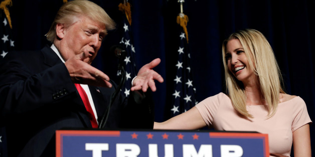 Republican presidential nominee Donald Trump directs his daughter Ivanka to the microphone during a campaign rally in Greenville, North Carolina, U.S., September 6, 2016. REUTERS/Mike Segar