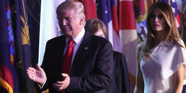 NEW YORK, NY - NOVEMBER 09: Republican president-elect Donald Trump walks on stage along with his son Barron Trump (C) and his wife Melania Trump to deliver his acceptance speech at the New York Hilton Midtown in the early morning hours of November 9, 2016 in New York City. Donald Trump defeated Democratic presidential nominee Hillary Clinton to become the 45th president of the United States. (Photo by Spencer Platt/Getty Images)