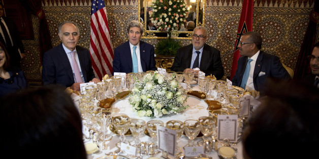 (L-R) Moroccan Foreign Minister Salaheddine Mezouar, U.S. Secretary of State John Kerry, Moroccan Prime Minister Abdelilah Benkirane and U.S. Ambassador to Morocco Dwight Bush attend a dinner meeting at the Guest Palace Residence in Rabat April 3, 2014. REUTERS/Jacquelyn Martin/Pool (MOROCCO - Tags: POLITICS)
