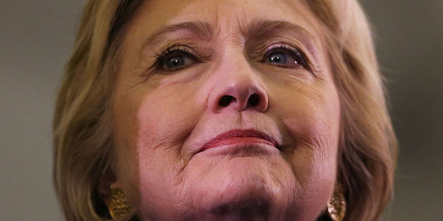 Democratic U.S. presidential nominee Hillary Clinton smiles during the first presidential debate with Republican U.S. presidential nominee Donald Trump at Hofstra University in Hempstead, New York, U.S., September 26, 2016. REUTERS/Brian Snyder