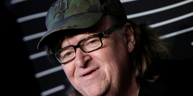 Filmmaker Michael Moore poses as he arrives for the 20th Annual Webby Awards in Manhattan, New York, U.S., May 16, 2016. REUTERS/Mike Segar