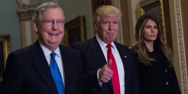 US President-elect Donald Trump (C) walks with his wife Melania Trump, and Senate Majority Leader Mitch McConnell (R-KY) on Capitol Hill in Washington,DC on November 10, 2016. / AFP / NICHOLAS KAMM (Photo credit should read NICHOLAS KAMM/AFP/Getty Images)