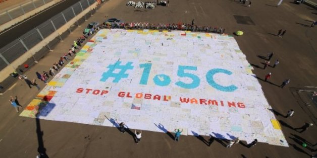 COP22: Des enfants forment un "1,5°C" géant contre le réchauffement climatique