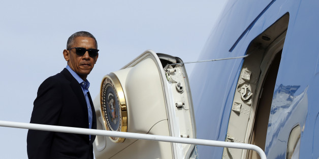 President Barack Obama boards Air Force One in Andrews Air Force Base, Md., Sunday, Nov. 6, 2016, en route to Florida, where he will speak at a campaign event for Democratic presidential candidate Hillary Clinton at Osceola County Stadium. (AP Photo/Carolyn Kaster)