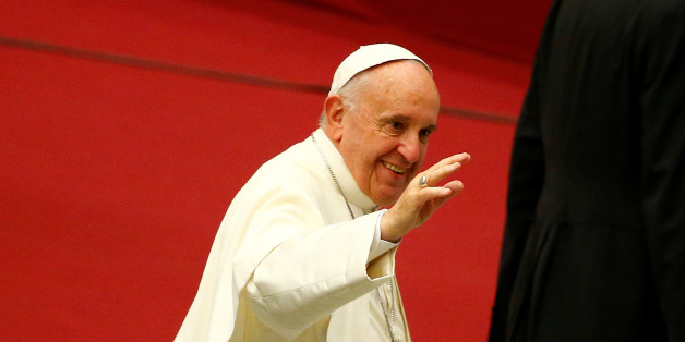 Pope Francis waves as he arrives to lead a Jubilee audience with people socially excluded in Paul VI hall at the Vatican November 11, 2016. REUTERS/Tony Gentile