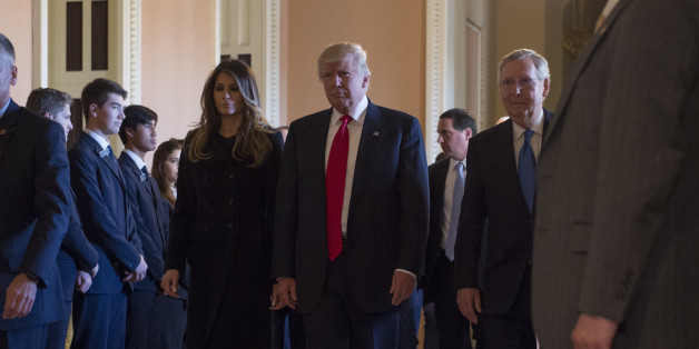 President-elect Donald Trump and his wife Melania walk with Senate Majority Leader Mitch McConnell of Ky. on Capitol Hill in Washington, Thursday, Nov. 10, 2016, after their meeting. (AP Photo/Molly Riley)