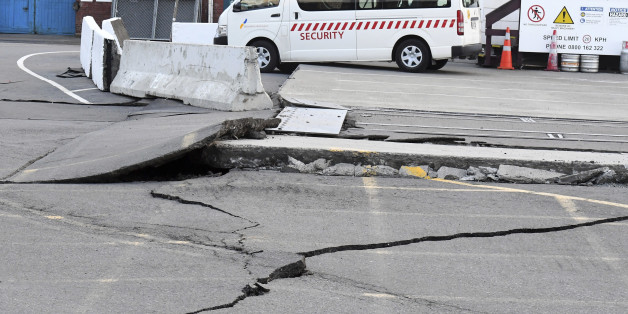 Fissures run along a road by the Centre Port in Wellington, Monday, November 14, 2016, after a major earthquake struck New Zealand's south Island early Monday. A powerful earthquake struck in a mostly rural area close to the city of Christchurch but appeared to be more strongly felt in the capital, Wellington, more than 200 Km (120 miles) away. (Ross Setford/SNPA via AP)