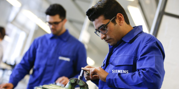 Flüchtlinge bei einem Workshop von Siemens