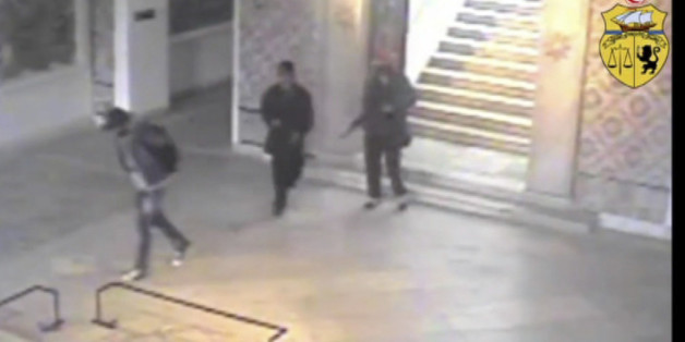 In this frame made from CCTV and released by the Tunisian government on Saturday March 21 2015, two gunmen and third unidentified man can be seen inside the Bardo museum in Tunis, on Wednesday, March 18, 2015. Two Tunisians trained in neighbouring Libya opened fire in the museum Wednesday, killing 21 people before they died in a shootout with security forces. (AP Photo / Tunisian Interior Ministry)