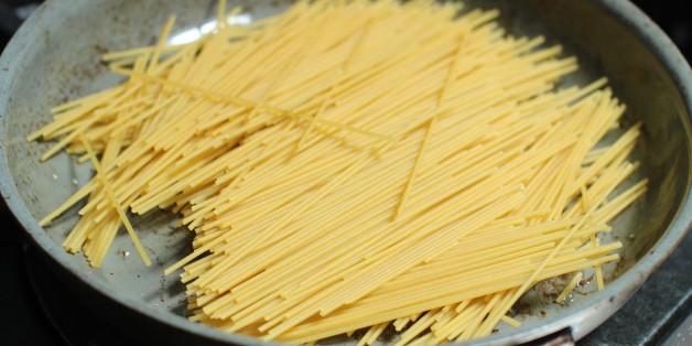 This June 22, 2015 photo shows the preparation of pasta for breakfast for dinner spaghetti in Concord, N.H. This dish is from a recipe by Sara Moulton. (AP Photo/Matthew Mead)