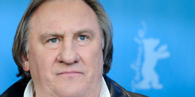 Actor Gerard Depardieu poses during a photocall to promote the movie 'Saint Amour' at the 66th Berlinale International Film Festival in Berlin, Germany February 19, 2016. REUTERS/Stefanie Loos
