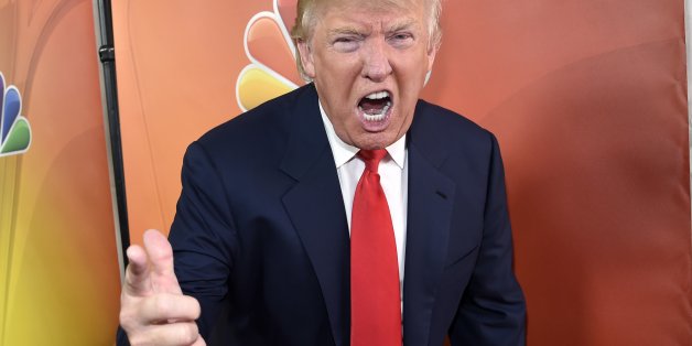 FILE - In this Jan. 16, 2015 file photo, Donald Trump, host of the television series "The Celebrity Apprentice," mugs for photographers at the NBC 2015 Winter TCA Press Tour in Pasadena, Calif. The skyline shimmers, the music pulses and Donald Trumpâs helicopter swoops in for a landing. Oozing authority, the billionaire strides purposefully, in slow-motion, for added impact, toward some important matter of business in âNew York, my city,â as Trump calls it. Week by week, year by y