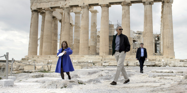 US President Barack Obama (R) walks in front of the Parthenon during a tour of the Acropolis on November 16, 2016 in Athens, Greece.
Obama will sketch out his vision of democracy at a time of mounting global populism, seeking to soothe European allies anxious over a Donald Trump presidency. / AFP / Brendan Smialowski (Photo credit should read BRENDAN SMIALOWSKI/AFP/Getty Images)