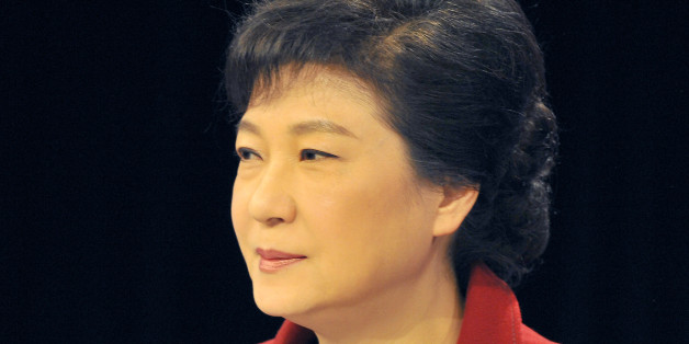South Korea's presidential candidate Park Geun-hye of the ruling Saenuri Party takes part in a televised debate with opposition candidates Lee Jung-hee and Moon Jae-in in Seoul, South Korea, on Monday, Dec. 10, 2012. (AP Photo/Kim Jae-hwan, Pool)