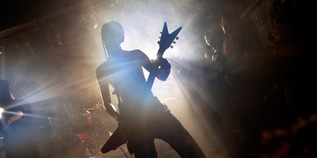 Mega Souls perform on the stage of Mao Live House during the club's last public concert night in central Beijing, China April 23, 2016. Mao Live House, a prominent live rock music venue in Beijing, shut its doors on the weekend, the latest closure to hit China's rock music scene. Owner Li Chi said the club, popular among fans of punk, metal and alternative rock since it opened nine years ago, was forced to close due to tighter rules on live performances. REUTERS/Damir Sagolj SEARCH "MAO LIVE" FOR THIS STORY. SEARCH "THE WIDER IMAGE" FOR ALL STORIES