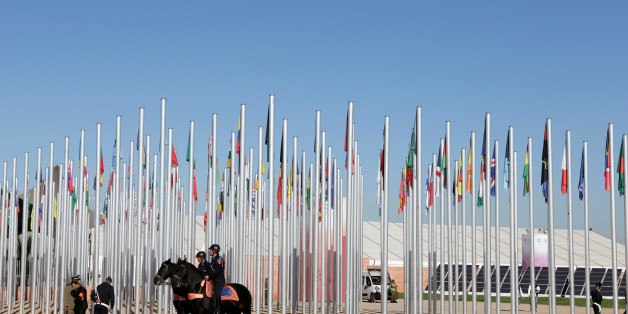 Moroccan security stand guard in front of the entrance of the UN Climate Change Conference 2016 (COP22) in Marrakech, Morocco, November 14, 2016. REUTERS/Youssef Boudlal
