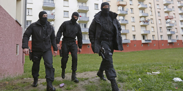French special Police forces patrol a residential building area in the Meinau suburb of Strasbourg, May 13. 2014. Interior Security (DGSI) services reinforced by special RAID and GIPN intervention forces conducted early morning raids to arrest six alleged djihadists who travelled back from Syria, French Interior minister announced. REUTERS/Vincent Kessler (FRANCE - Tags: CRIME LAW TPX IMAGES OF THE DAY)